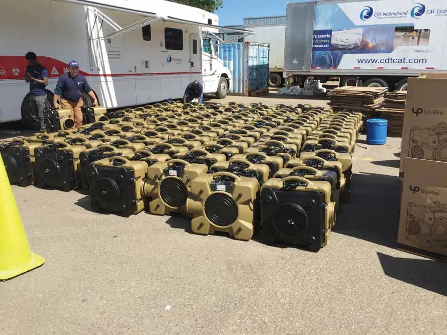 Rows of air movers being prepared for a government project