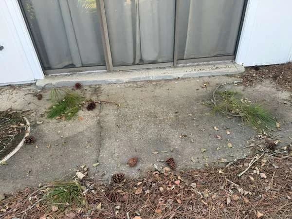 A sliding patio door with the patio surface right at the threshold