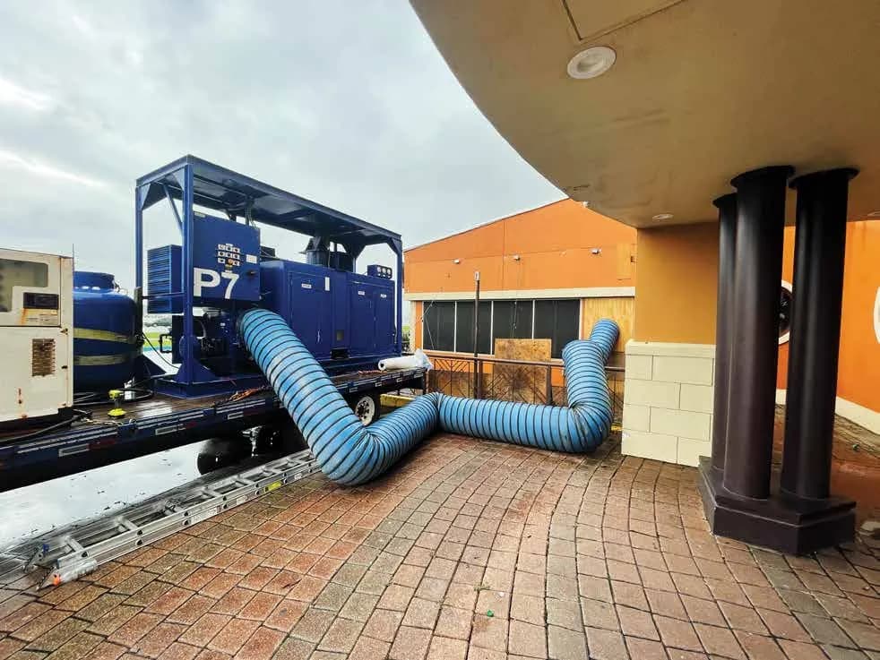 A large desiccant dehumidifier on a trailer, with ducting attached