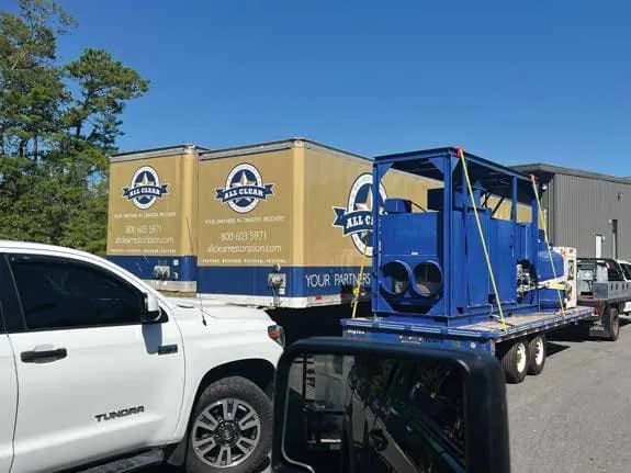 53-foot ALL CLEAR semi trailers and an industrial desiccant being prepared for deployment